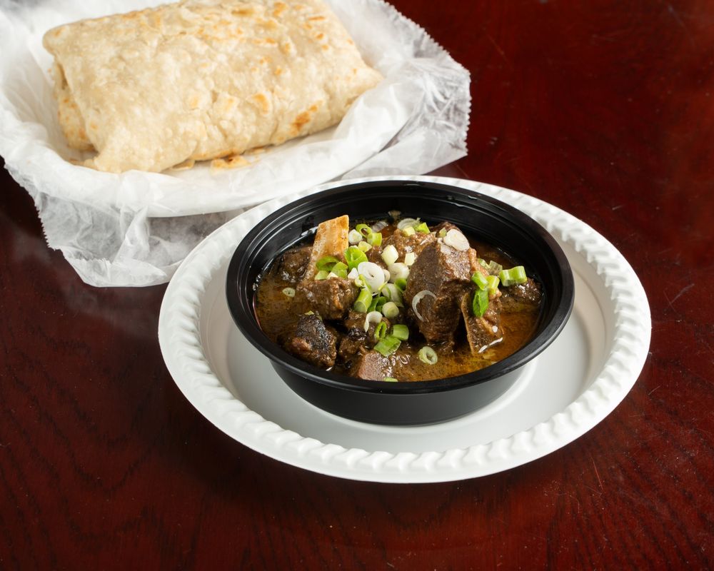 Curry goat with roti