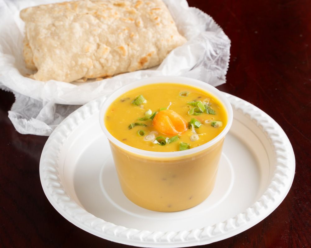 Dhal with roti and a wiri wiri pepper